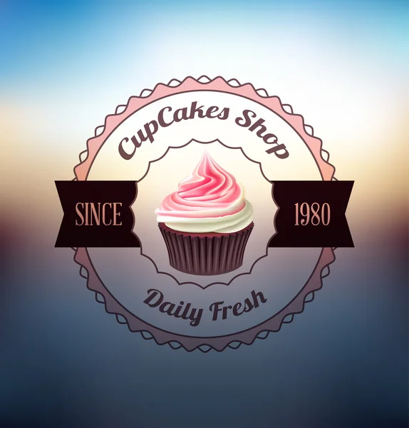Cupcake με ετικέτα πέρα από θολή υπόβαθρο — Διανυσματικό Αρχείο