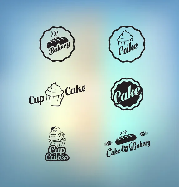 Vintage-Cupcakes und Bäckereiabzeichen und Etiketten — Stockvektor