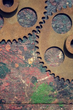 Cogwheels renkli ahşap arka plan üzerinde filtre uygulanmış resim