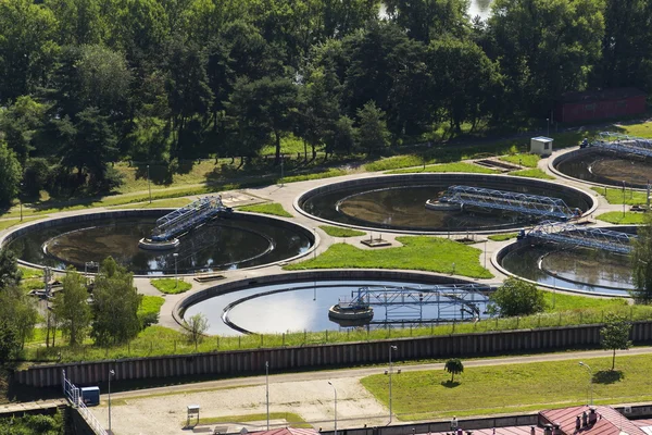 Aerial view of storage tanks in sewage water treatment plant — Stock Photo, Image