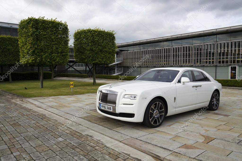WESTHAMPNETT, UNITED KINGDOM - AUGUST 11: Rolls-Royce Ghost in front of the Goodwood plant on August 11, 2016 in Westhampnett, United Kingdom.