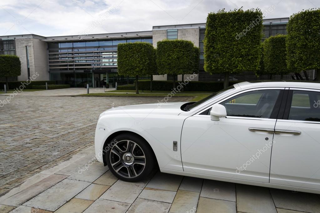 WESTHAMPNETT, UNITED KINGDOM - AUGUST 11: Rolls-Royce Ghost in front of the Goodwood plant on August 11, 2016 in Westhampnett, United Kingdom.
