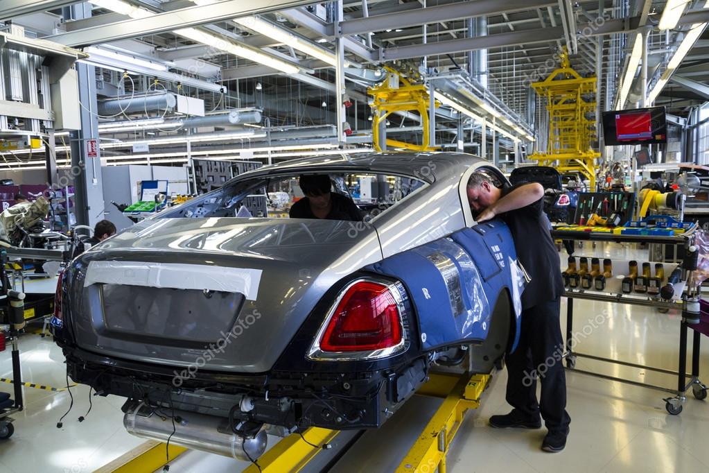 WESTHAMPNETT, UNITED KINGDOM - AUGUST 11: Rolls-Royce cars stand on production line in Goodwood factory on August 11, 2016 in Westhampnett, United Kingdom. Rolls-Royce skips Paris Motor Show.