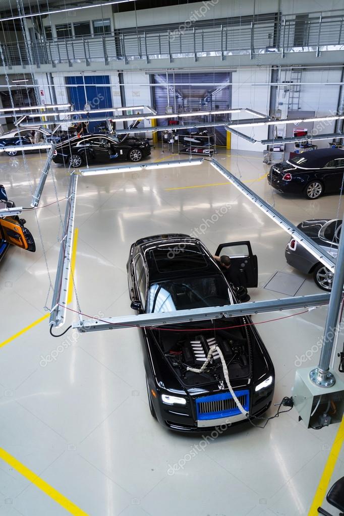 WESTHAMPNETT, UNITED KINGDOM - AUGUST 11: Rolls-Royce cars stand on production line in Goodwood factory on August 11, 2016 in Westhampnett, United Kingdom. Rolls-Royce skips Paris Motor Show.