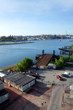 Göteborg şehri, 13 Mayıs 2025 'te İsveç' in Göteborg şehrinde güneşli bir günde kıyı şeridi ile ufuk çizgisi oluşturdu..