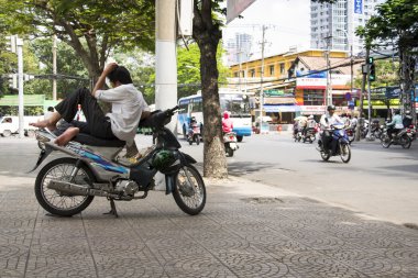 Adam scooter sokak Ho Chi Minh City, Vietnam dayanmaktadır