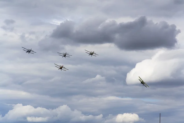 Group of Antonov An-2 biplanes flying — Stock Photo, Image