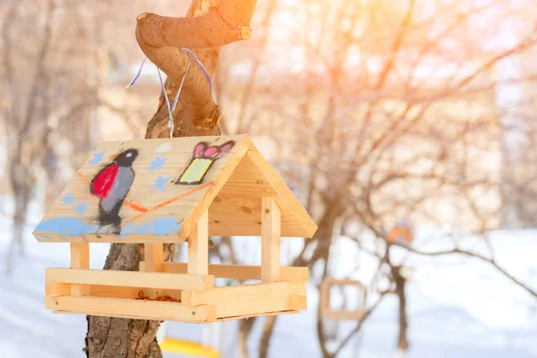 Birdhouse with painted bullfinch — Stock Photo, Image