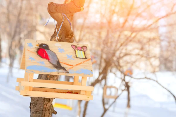 Birdhouse with painted bullfinch — Stock Photo, Image