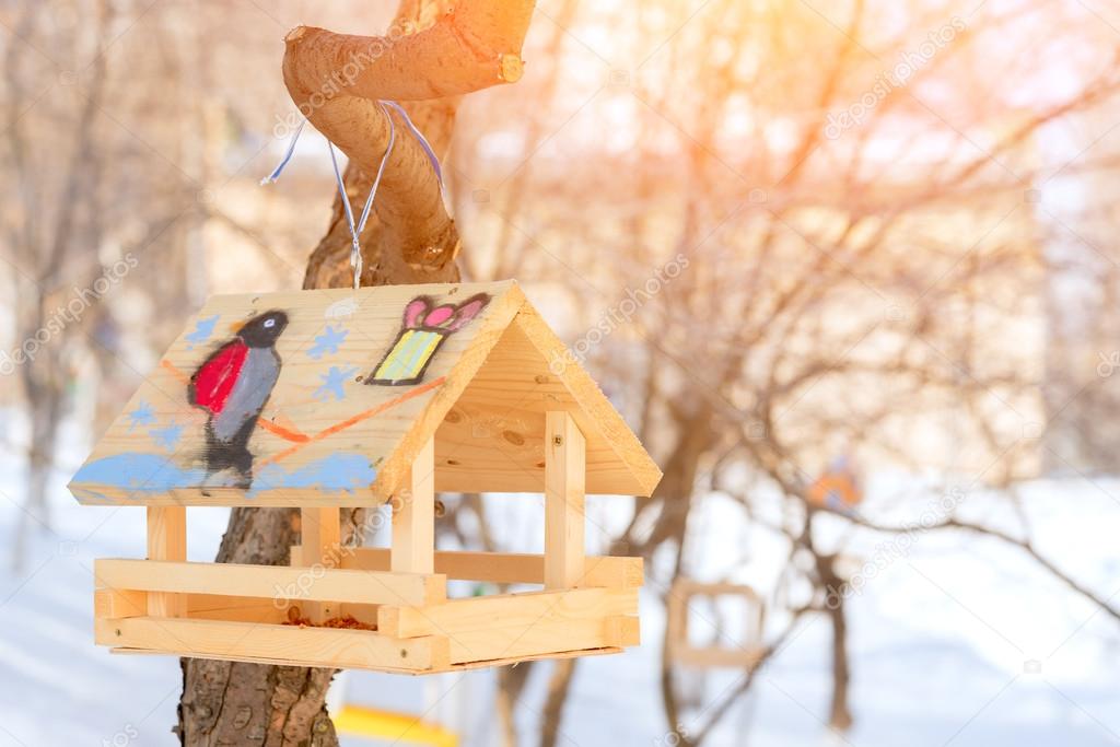 Birdhouse with painted bullfinch