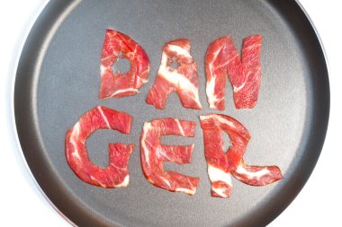 Tehlike teflon üzerinde yazıt