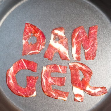 Tehlike teflon üzerinde yazıt