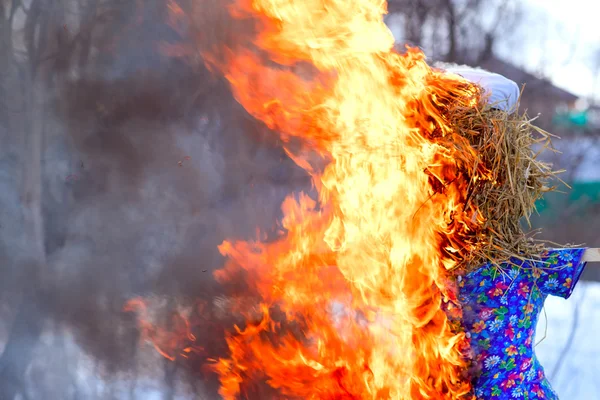 Burning stuffed figure — Stock Photo, Image