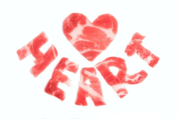 Un pedazo de carne en forma de corazón —  Fotos de Stock