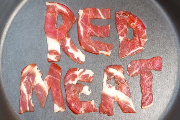 La inscripción CARNE ROJA en el teflón —  Fotos de Stock