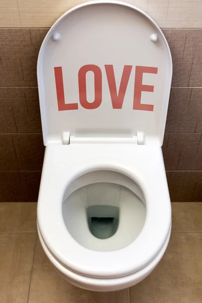 Toilet with inscription "Love" — Stock Photo, Image