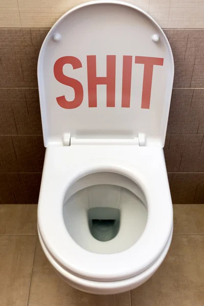 Toilet with an inscription "Shit" — Stock Photo, Image