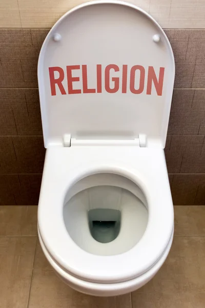 Toilette con un'iscrizione "Religione " — Foto Stock