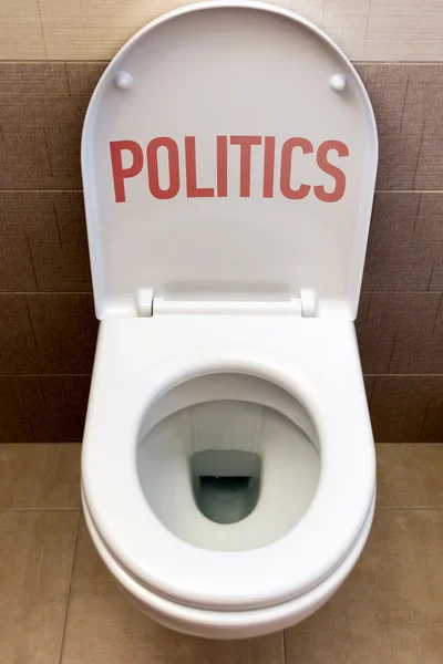 WC egy felirat "politika" — Stock Fotó