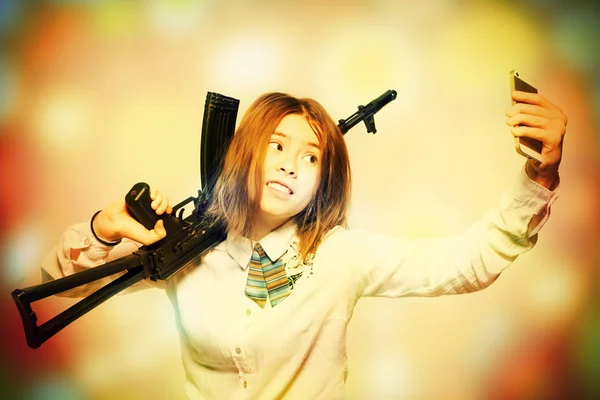 Girl with Kalashnikov makes selfie — Stock Photo, Image