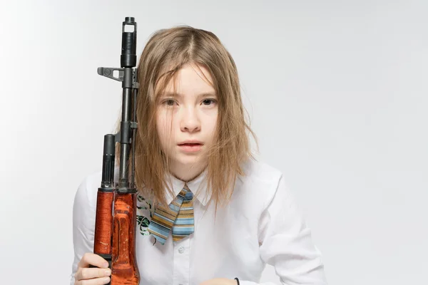 Girl holding Kalashnikov — Stock Photo, Image