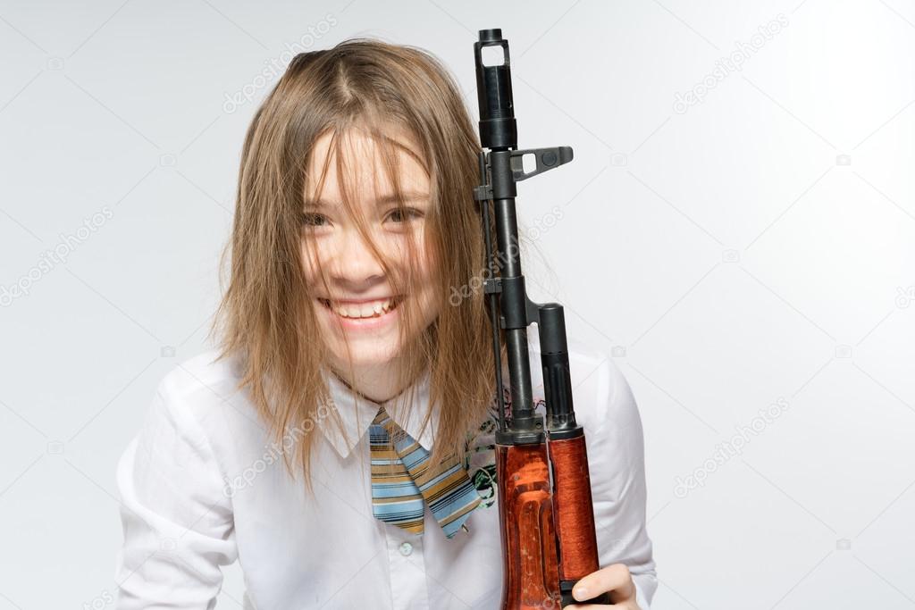 Girl holding Kalashnikov 