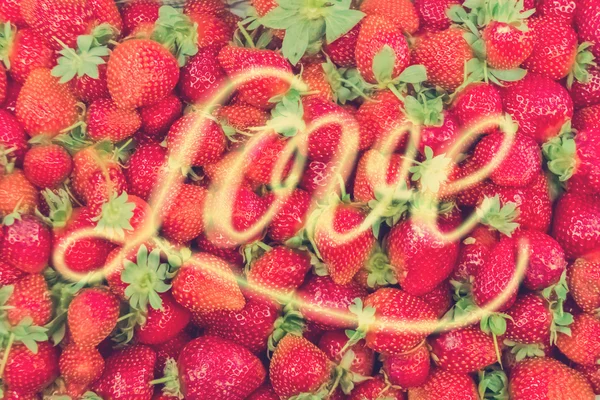 Strawberry with inscription Love — Stock Photo, Image