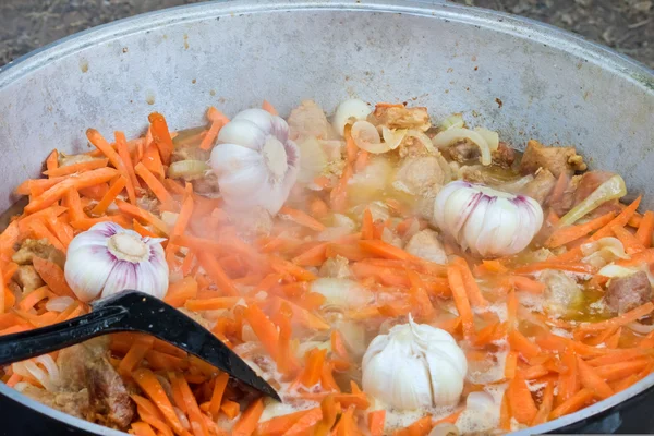 Cooked in a metal pan — Stock Photo, Image