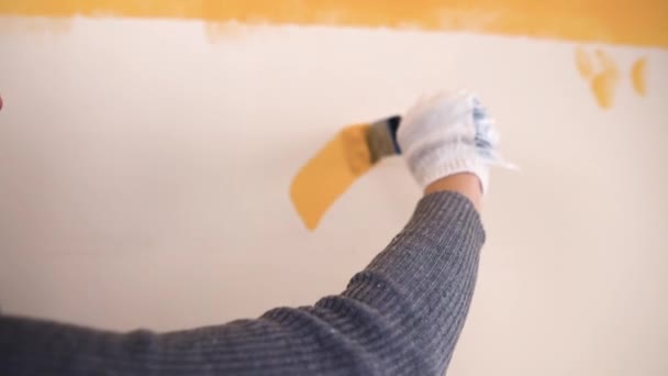 Man Paints Question Mark Wall Orange Paint — Stock Video