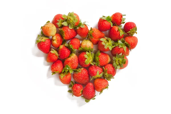 Heart-shaped group of strawberries — Stock Photo, Image