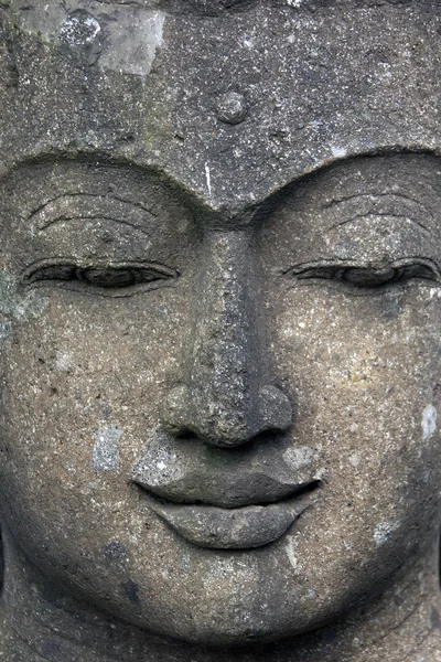 Pedra dura cara de Buda — Fotografia de Stock