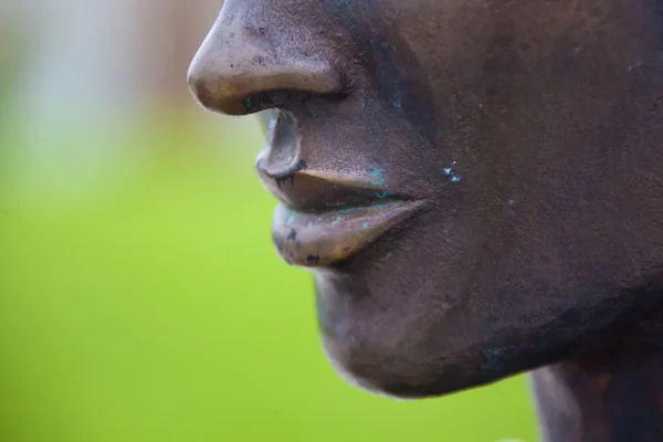 Partie d'un visage de statue féminine — Photo