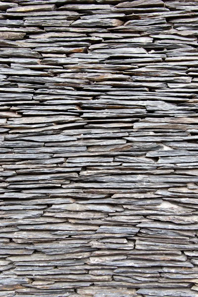 Текстура плоскої кам'яної стіни — стокове фото