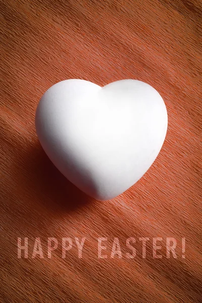 White egg in a heart shape — Stock Photo, Image