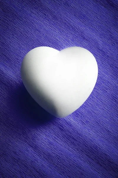 White egg in a heart shape — Stock Photo, Image