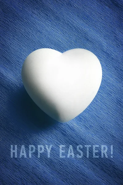 White egg in a heart shape — Stock Photo, Image