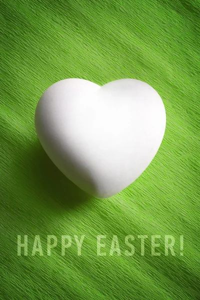 White egg in a heart shape — Stock Photo, Image