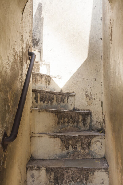Old staircase leading to the light.