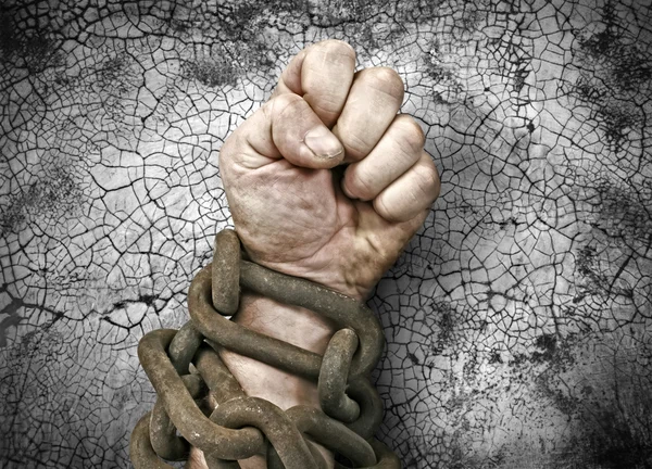 Hand, fist in chains — Stock Photo, Image