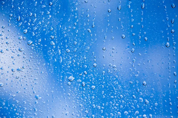 Gotas de água em vidro — Fotografia de Stock