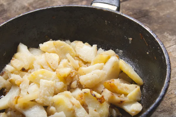 Pan with crispy potato — Stock Photo, Image