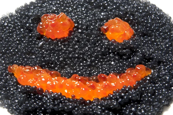 A face with a smile of caviar — Stock Photo, Image