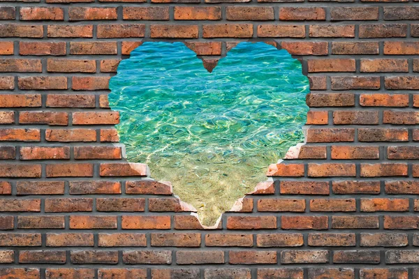 Brick wall shaped as a heart — Stock Photo, Image