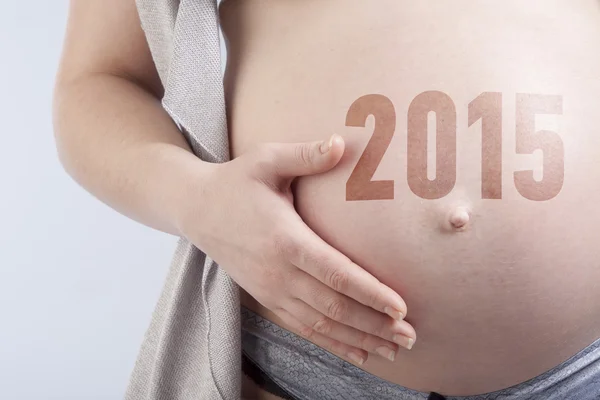 Zwangere vrouw met titel — Stockfoto