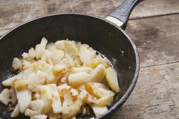 Pan with crispy potato — Stock Photo, Image