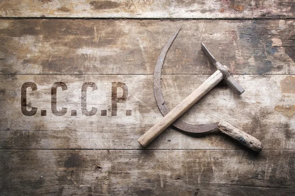 Hammer and sickle in the form of the coat of arms — Stock Photo, Image