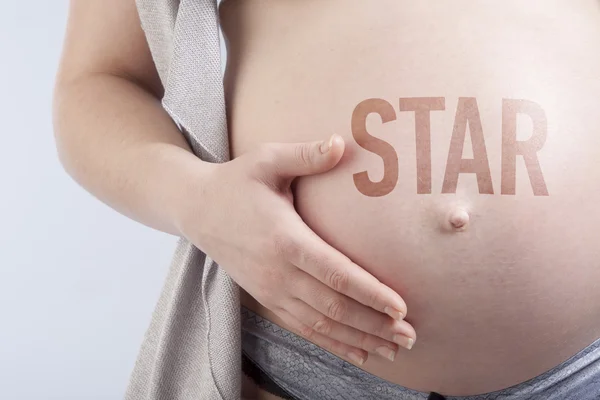 Pregnant woman with title — Stock Photo, Image