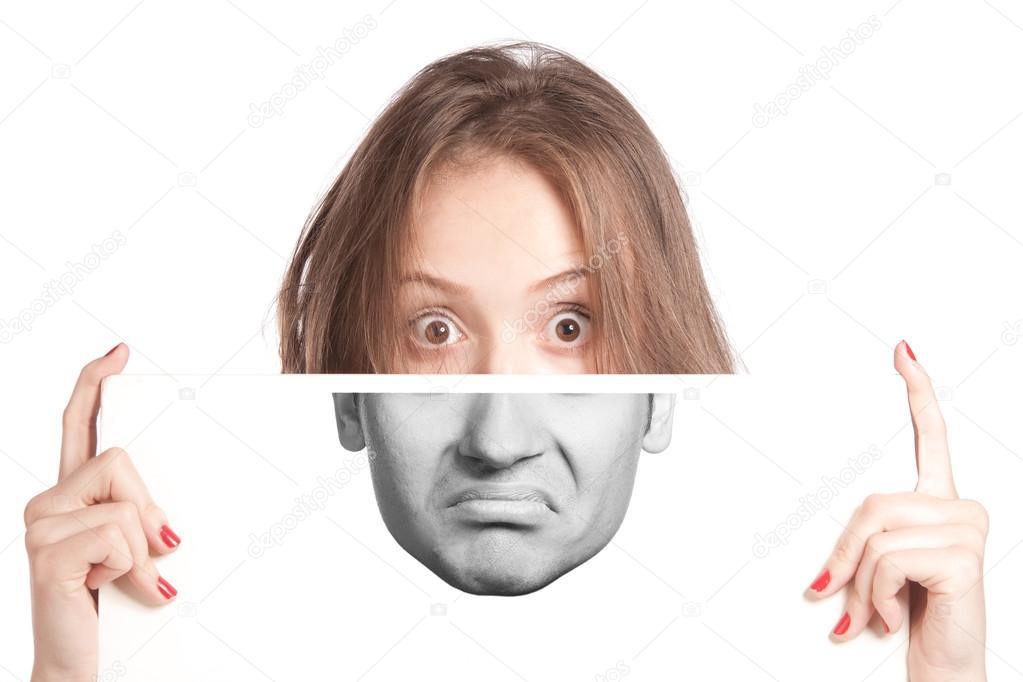 Woman holding a sign on a face