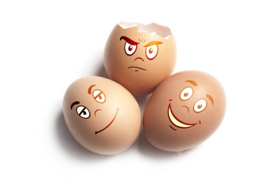 Eggshells with painted doodle faces clipart