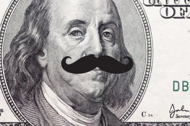 Face on dollar bill with mustache